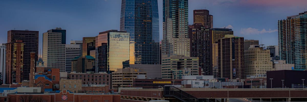 Skyscrapers rising above the rooftops of downtown Denver, Colorado