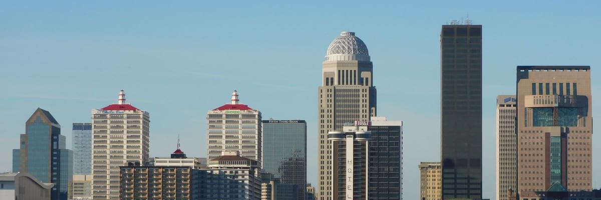 Skyscrapers of downtown Louisville, Kentucky, against a blue sky