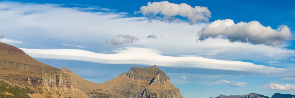 Mountains in Glacier National Park, Montana, under a clear blue sky