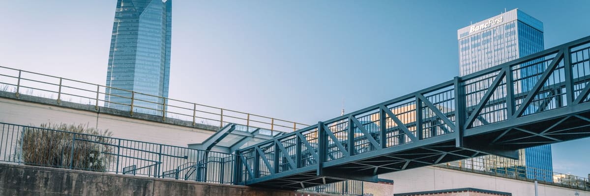 A footbridge and glass skyscrapers in downtown Oklahoma City, Oklahoma