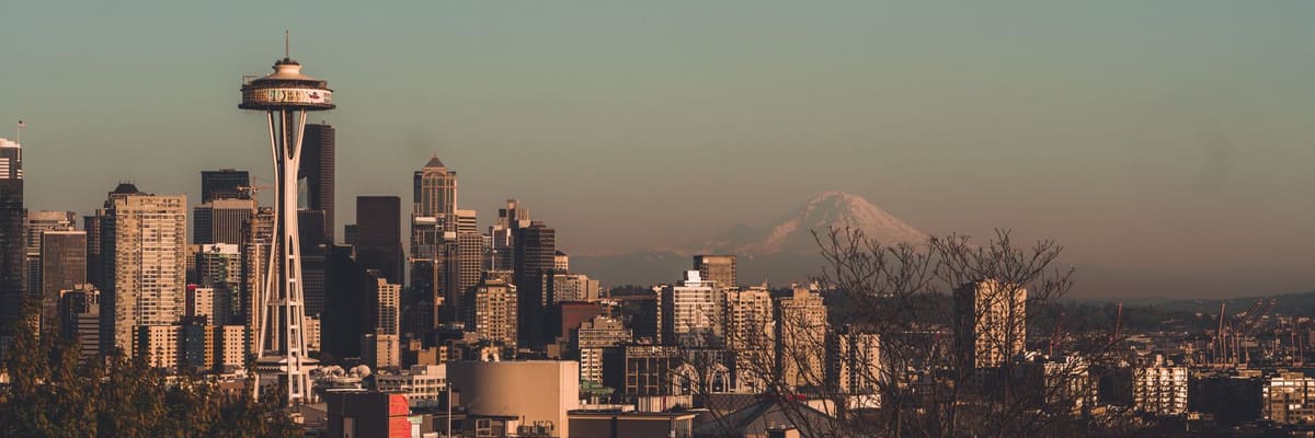 The Seattle, Washington skyline with the Space Needle and Mount Rainier behind it